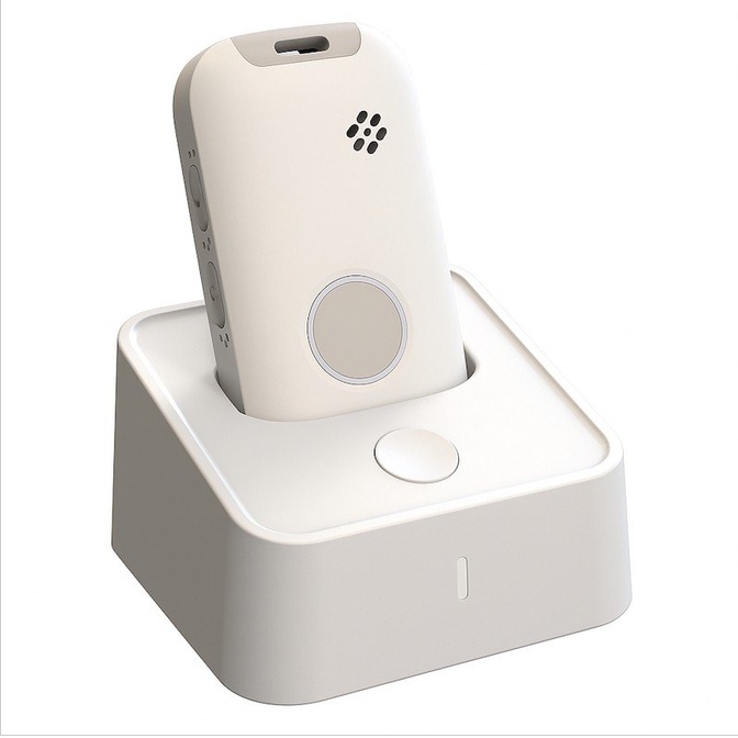 White 4G SOS pendant in its charging cradle